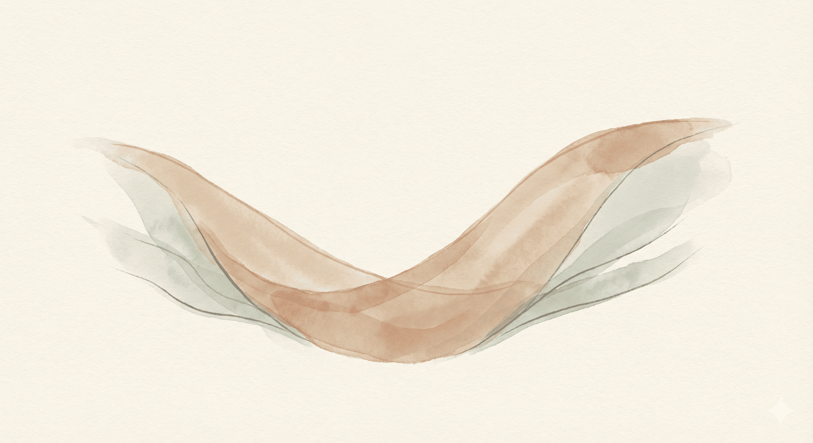 Parent holding baby in warm, soft light